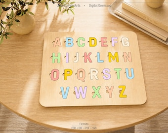 May include: A square wooden board featuring the English alphabet with each letter cut out in a pastel color palette. The letters A through Z are arranged in four rows. The text LaserCutFilesArts, Digital Download, and Formats CDR DXF PDF SVG are visible.