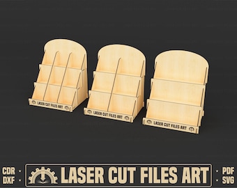 May include: Three wooden display stands with four shelves each. The stands are made of light brown wood and have a simple, modern design. Each stand has the text "LASER CUT FILES ART" printed on the bottom shelf.