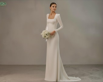 Vestido de novia minimalista de crepé: escote cuadrado, manga larga, espalda descubierta.