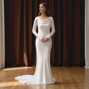Minimalist Satin Long Sleeve Cowl Neck Wedding Dress, Modern Open Back Sheath Silhouette Wedding Dress with Chapel Train.