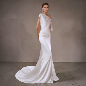 Modern One Shoulder Satin Wedding Dress: Ruched Waist, Long Train, Bow Tie