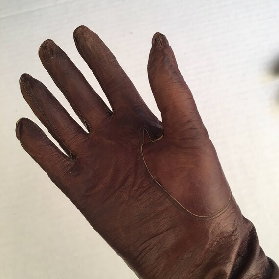 dark red leather gloves
