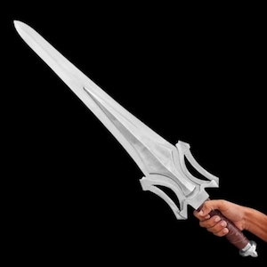 May include: A silver-colored sword with a long, pointed blade and a decorative hilt. The hilt has a brown leather-wrapped grip and a silver pommel. The sword is held against a black background.