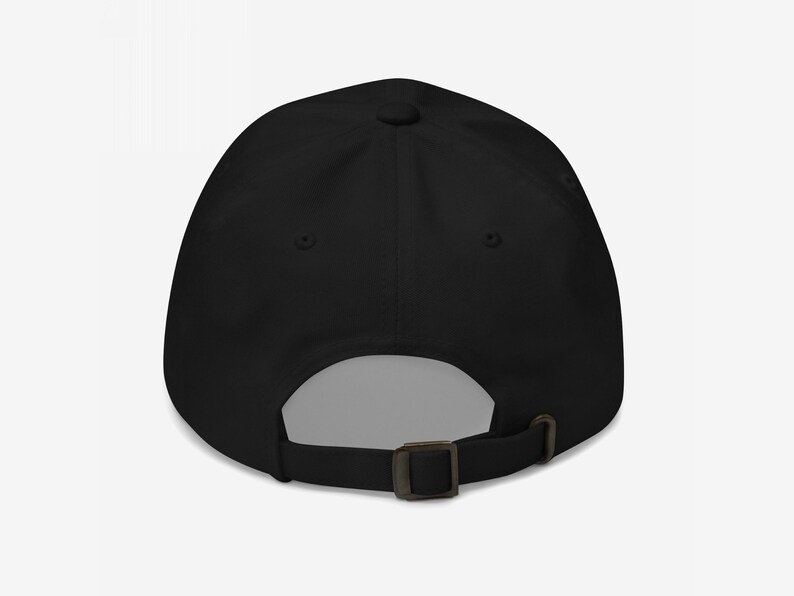 Rear view of the personalized Anti-Fascist black dad hat with adjustable strap and antique brass buckle.