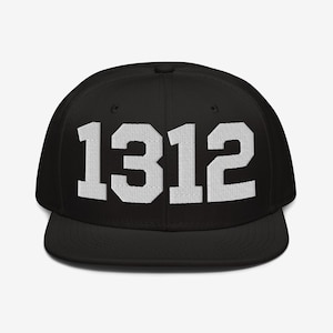 May include: Black baseball cap featuring the white embroidered number "1312". The cap has a flat peak and a structured fit. A classic style hat, suitable for casual wear.