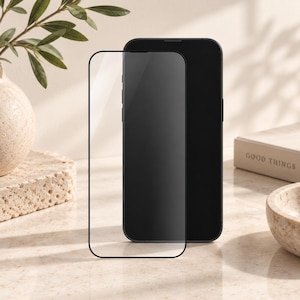 May include: A clear, rectangular glass screen protector with a thin black border positioned directly in front of a dark-colored smartphone. The screen protector features rounded corners and is designed to cover the entire front display area.
