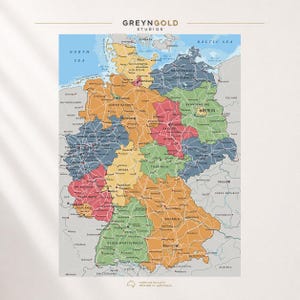 Puede incluir: Un mapa colorido de Alemania con el texto GREYNGOLD STUDIOS en la parte superior y PREMIUM QUALITY PRINTED IN AUSTRALIA en la parte inferior. El mapa muestra los estados en tonos naranja, verde, azul y rojo, con ciudades y carreteras.
