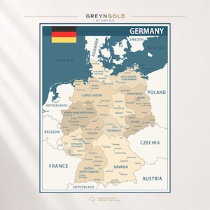May include: A wall map of Germany featuring the German flag in the top left corner, the text GREYNGOLD STUDIOS at the top, and the text PREMIUM QUALITY PRINTED IN AUSTRALIA at the bottom. The map displays states, cities, and neighbouring countries.