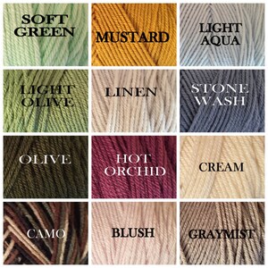 May include: A collection of yarn skeins in various colors, including soft green, mustard, light aqua, light olive, linen, stone wash, olive, hot orchid, cream, camo, blush, and gray mist.