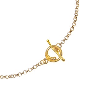 May include: A gold chain necklace with a toggle clasp.