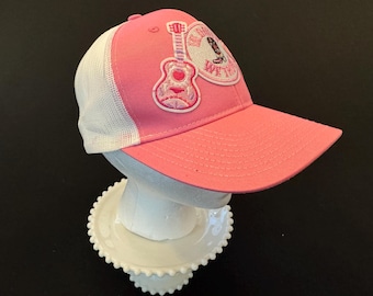 In Dolly We Trust Trucker Hat: Pink Cowgirl Style Snapback