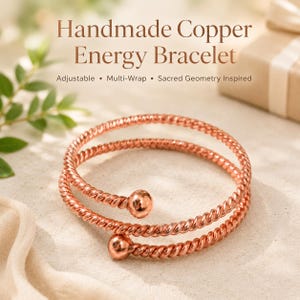May include: A copper-coloured metal bracelet featuring a multi-wrap design with a twisted texture and a smooth spherical bead at each end. The text "Handmade Copper Energy Bracelet" and "Adjustable • Multi-Wrap • Sacred Geometry Inspired" is visible.