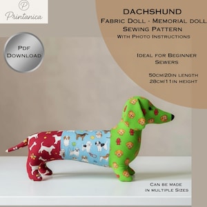 May include: A fabric dachshund doll sewing pattern with a colourful design. The doll is divided into red, blue, and green sections, each patterned with dog-themed designs. The pattern includes photo instructions and is 50cm long and 28cm high.