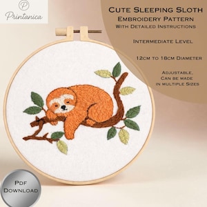 May include: An embroidery hoop with a cute sleeping sloth design. The sloth is orange and brown, resting on a brown branch with green leaves. The text reads "CUTE SLEEPING SLOTH EMBROIDERY PATTERN" and the diameter is 4.7 to 7 inches.