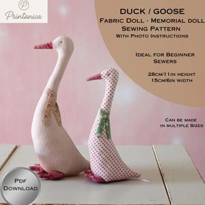 May include: Two fabric duck or goose dolls. One is white with floral accents, the other is pink with white polka dots. Both have pink beaks and feet. The image includes text: "DUCK / GOOSE FABRIC DOLL - MEMORIAL DOLL SEWING PATTERN WITH PHOTO INSTRUCTIONS".