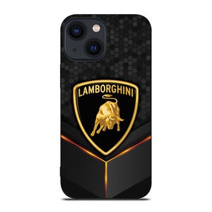 May include: Black iPhone case featuring the Lamborghini logo. The case has a gold emblem with a bull, set against a black and gold geometric design. The case is designed to fit a smartphone.