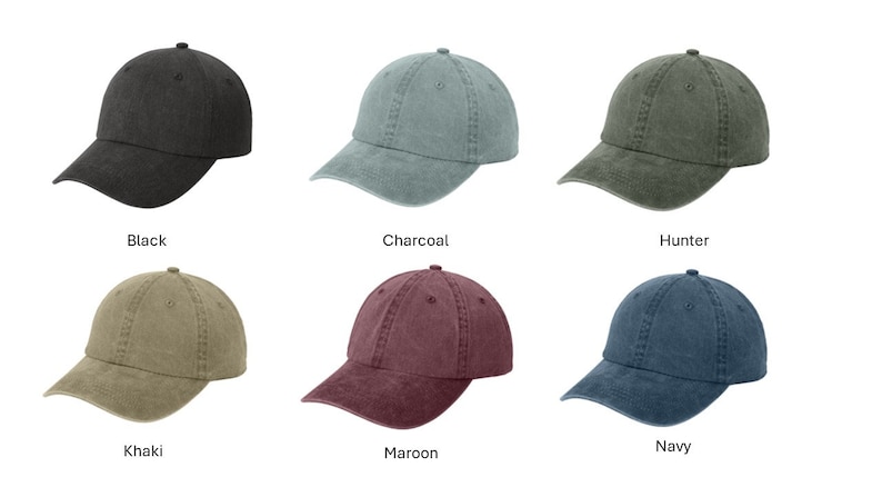 May include: A collection of six baseball caps in various colors: black, charcoal, hunter green, khaki, maroon, and navy blue. Each cap has a curved brim and a fabric strap closure at the back. The names of the colors are displayed below each cap.