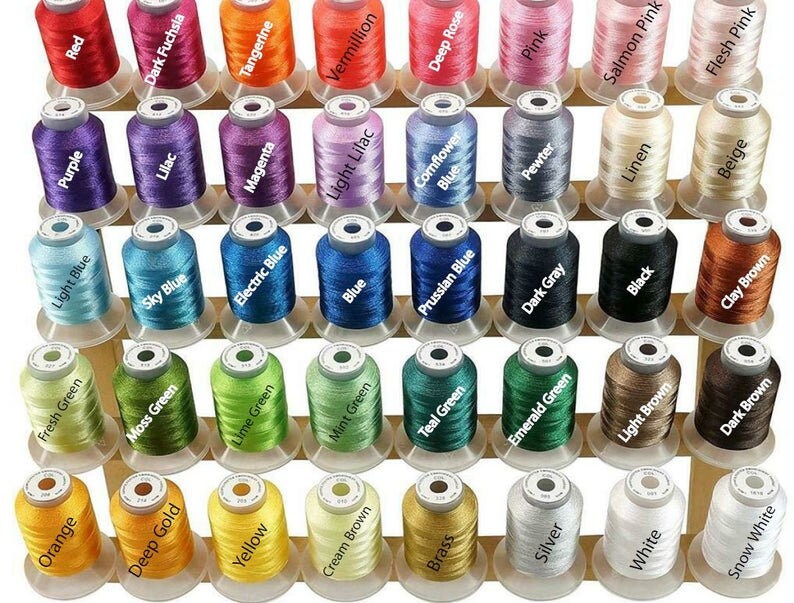 May include: A wooden spool rack with 48 spools of thread in various colors, including red, purple, orange, green, blue, pink, brown, beige, black, white, and gray. The spools are arranged in rows and columns on the rack.