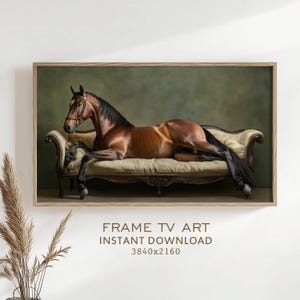 May include: A framed digital art print featuring a brown horse reclining on a cream-colored chaise lounge. The horse has a dark mane and tail, and is wearing a bridle. The background is a muted green. Text at the bottom reads "FRAME TV ART INSTANT DOWNLOAD 3840x2160".