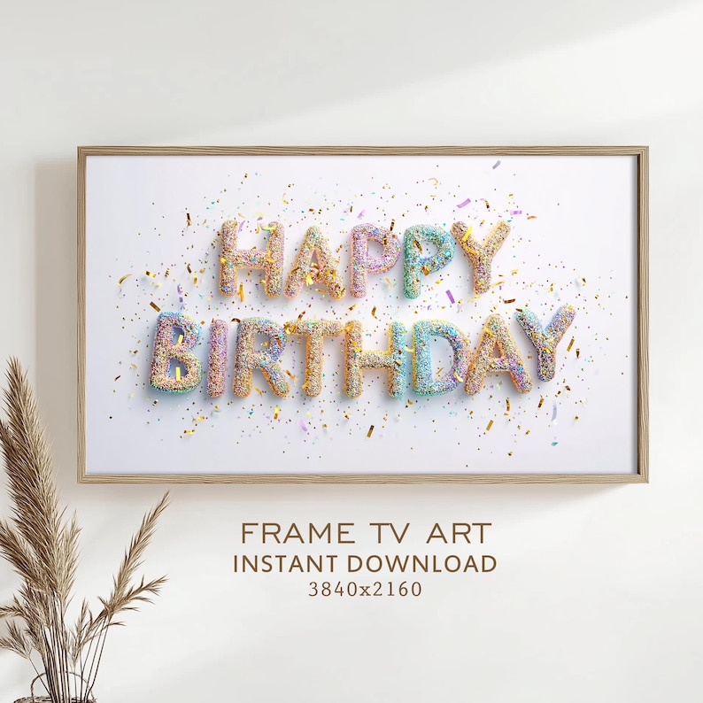 May include: A framed print with the words "HAPPY BIRTHDAY" in colorful, textured letters. The letters are sprinkled with confetti against a white background. The frame is a light wood color. The image also includes the text "FRAME TV ART INSTANT DOWNLOAD 3840x2160".