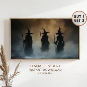 May include: A framed art print depicting three silhouetted figures in witch hats, holding staffs, against a misty, gradient background. The artwork is labeled "FRAME TV ART INSTANT DOWNLOAD 3840x2160" and includes a "BUY 1 GET 3" promotion.