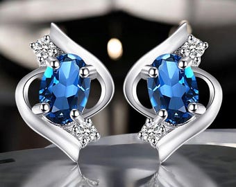 London Blue Topaz Stud Earrings: Oval 925 Sterling Silver
