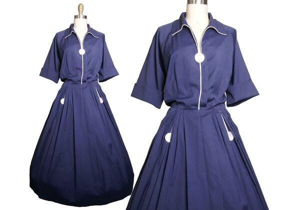navy blue dress with white piping