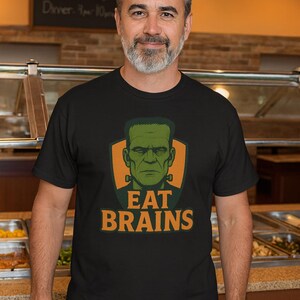 Halloween inspiriert Unisex aus schwerer Baumwolle T-Shirt - Eat Brains Grafik Shirt, gruselige Kleidung, Geschenk für Halloween, Casual Wear, Horror-Fans