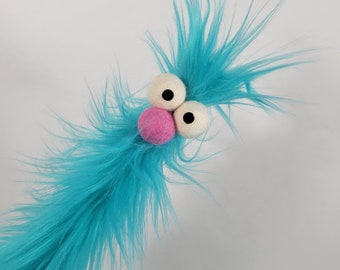 Sticklers: A Ridiculous Rod Puppet from All Hands Productions (TURQUOISE)