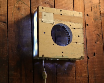 Eclipse, a handmade Art Lamp by Steve Rein, Wall hanging interactive light.