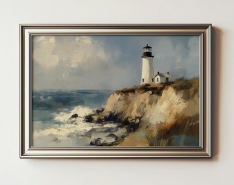 May include: A framed landscape painting depicts a white lighthouse with a black top, perched on a cliff overlooking the ocean. The artwork features a muted color palette of blues, browns, and whites, with visible brushstrokes. The painting is encased in a silver frame.
