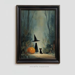 May include: Framed art print featuring a whimsical Halloween scene. A witch in a tall hat and a black cat stand near a carved pumpkin in a forest setting. The artwork has a vintage, storybook style with muted colors.