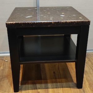 Coffee table with resin