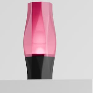 May include: A modern, decorative vase with a faceted, translucent pink upper section and a solid black base. The vase has a unique, geometric design and is set against a plain white background. The pink section appears to be lit from within.