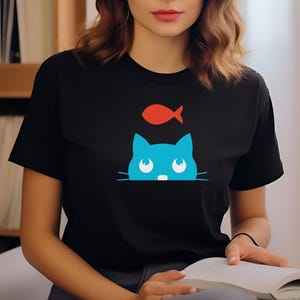 Cute Aqua Cat Dreaming of Fishing Minimal Unisex Jersey T-Shirt - Fun Gift for Cat Moms and Fishing Lovers Friends and Family