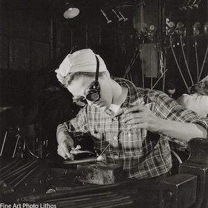 Empowering Snapshot: &quot;Woman at Work During WWII at the Bazooka Factory, 1944&quot; by Sam Shaw | Vintage Industrial Wartime Photography