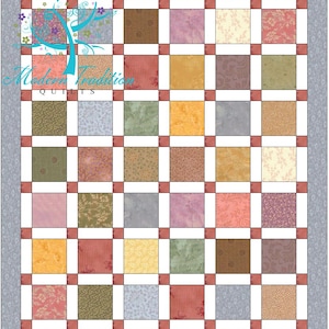 May include: A quilt featuring a grid of multi-colored fabric squares in shades of pink, yellow, green, brown, and blue, separated by white sashing and small red cornerstones. The quilt is bordered by a gray patterned fabric and includes a logo.