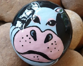 Hippo caricature rock art, painted stone