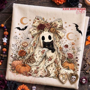 May include: A cream-colored fabric featuring a graphic print of a ghost wearing a large floral bow and holding a black cat. The design includes pumpkins, bats, crescent moons, stars, and spiderwebs in shades of orange, brown, and black.