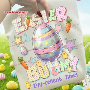May include: A cream-colored tote bag featuring an Easter-themed design. The design includes a large, decorated egg, carrots, stars, chicks, and the words "Easter Bunny" and "Egg-cellent Time!" in a playful font.