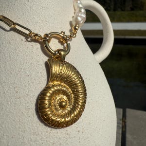Handmade ladies&#39; necklace with freshwater pearls & gold-plated link chain and pendant in fossil look – boho trendy jewelry - shell - stainless steel