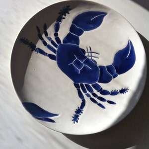 Navy blue crab ceramic round serving platter