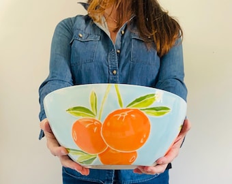 large ceramic serving bowl hand painted orange blue and green