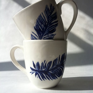 navy blue and white feather ceramic coffee, tea, mugs, cups by Jessica Howard image 1