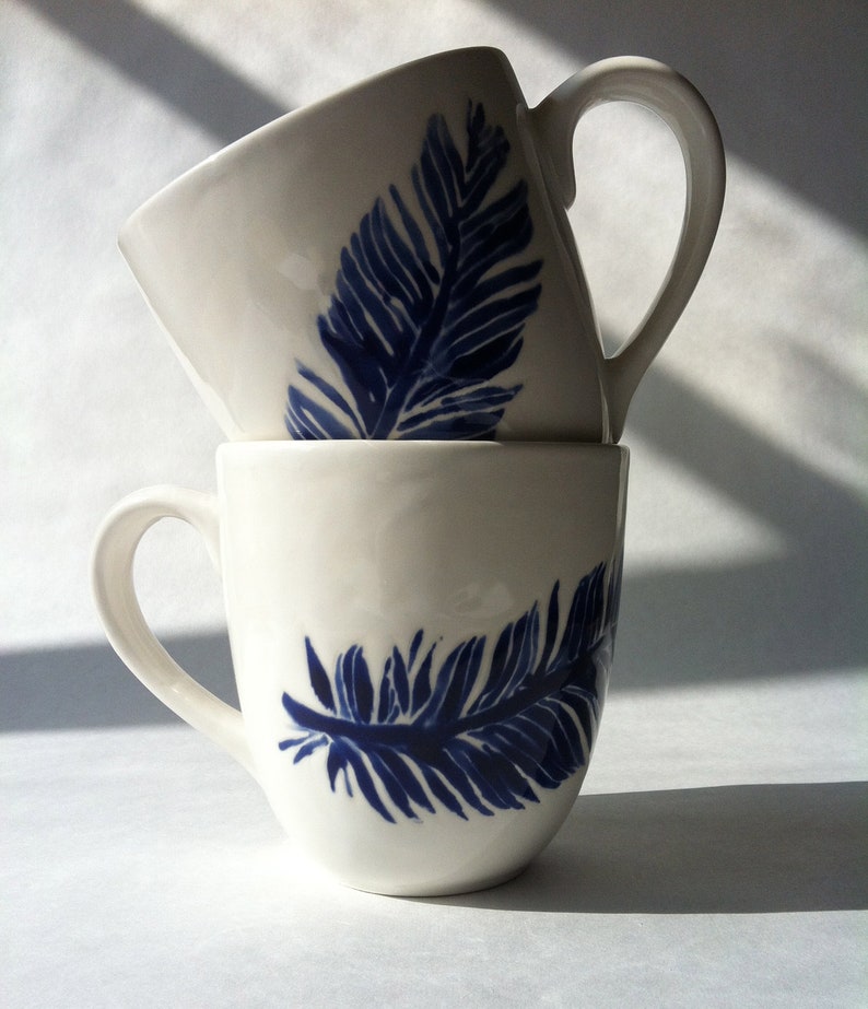 navy blue and white feather ceramic coffee, tea, mugs, cups by Jessica Howard image 1