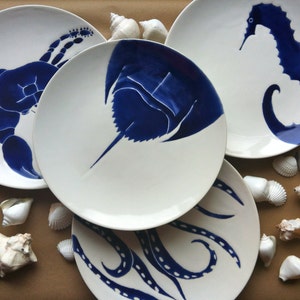 Set of 4 navy blue, nautical, beach themed ceramic dinner plates in horse shoe crab, octopus, blue crab and sea horse image 3