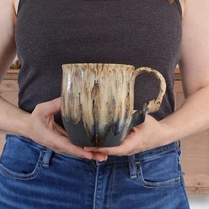 XL Cookies and cream glazed handmade Ceramic Mug 20oz: Twisted Handle, Half Glazed Pottery - rustic glazed mug, black lava texture