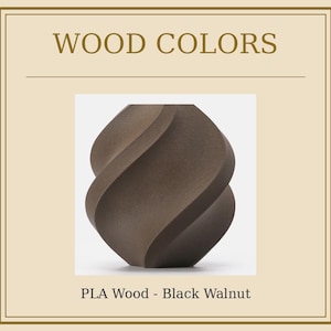 May include: A brown, abstract sculpture with a swirling design. The text "WOOD COLORS" is at the top, and "PLA Wood - Black Walnut" is at the bottom. The sculpture is made of wood.