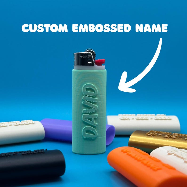 May include: A light blue lighter with the name "DAVID" embossed on the side. The lighter is surrounded by other lighters with different colors and names.