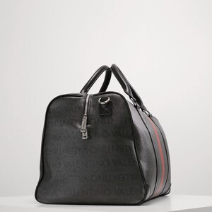 May include: Black duffel bag with a red stripe and the brand name printed all over. The bag has two handles and a zipper closure. The bag is made of a durable material and is suitable for travel.